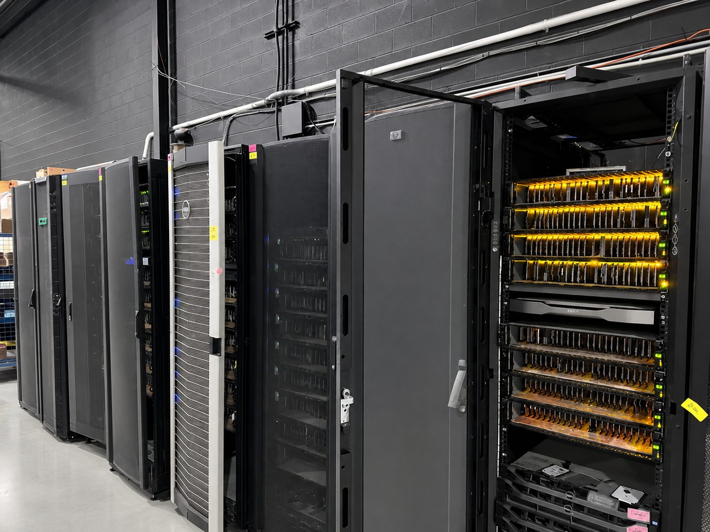 Racks of IT equipment staged in an ERA USA warehouse